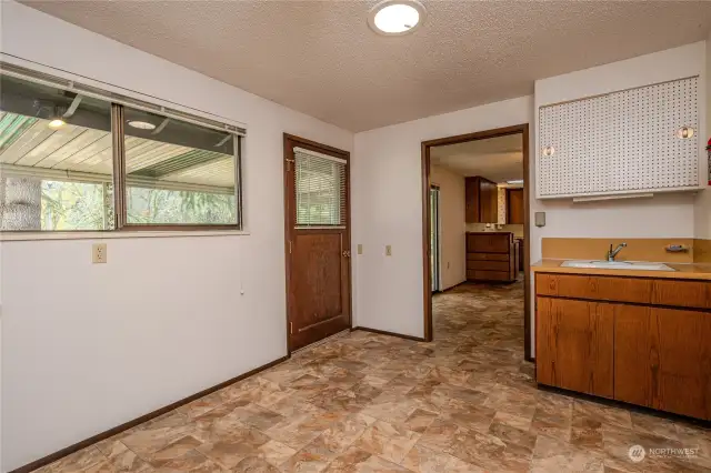 Utility room with utility sink