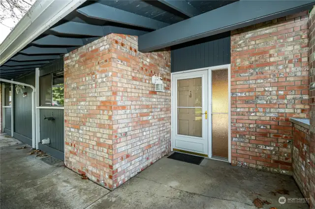 Front door with a secure storm door/screen