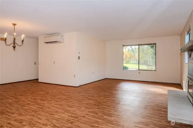 View of living room and dining room from entry