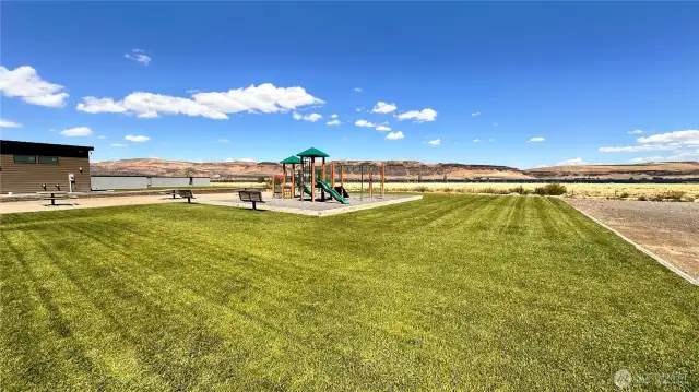 Park with big toys for kids and picnic tables to hang out at!