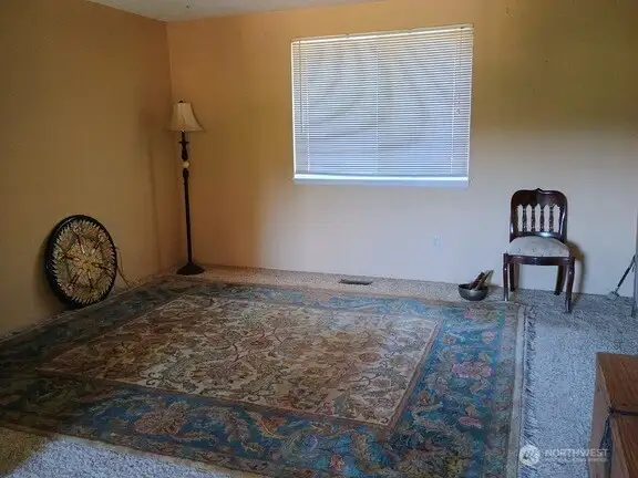 Flexible, large room adjacent to eat-in kitchen.