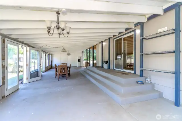 920 sf enclosed back patio.