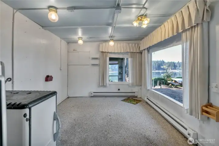 Main house kitchen adjoins living room area