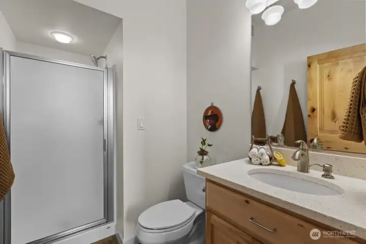 If you’ve been tinkering in the garage, no need to track through the house—the ¾ bath is right next door for a quick clean-up.