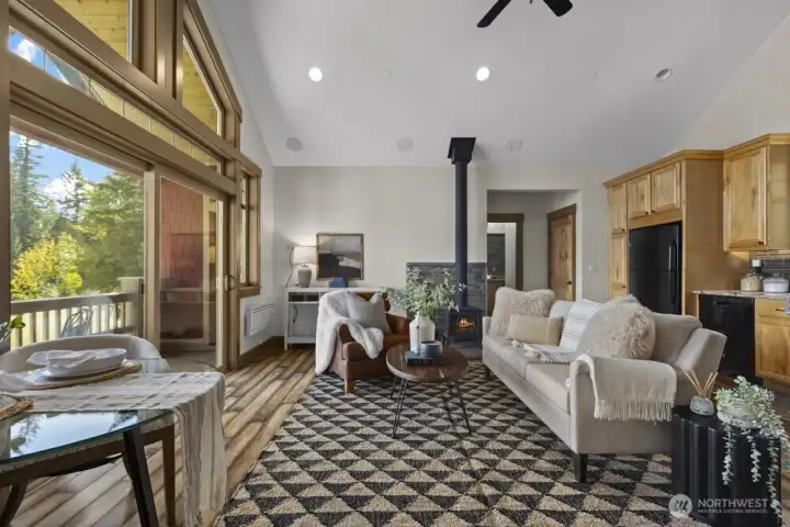 The wood-burning fireplace adds warmth and charm, especially when the colder months roll in.
