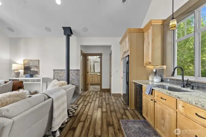 The 3/4 bath and bedroom are tucked at the opposite end of the living space for added privacy.