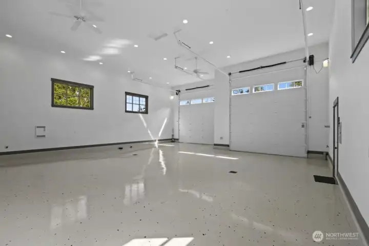 Massive bays, epoxy floors, heat, and power make it a dream space.