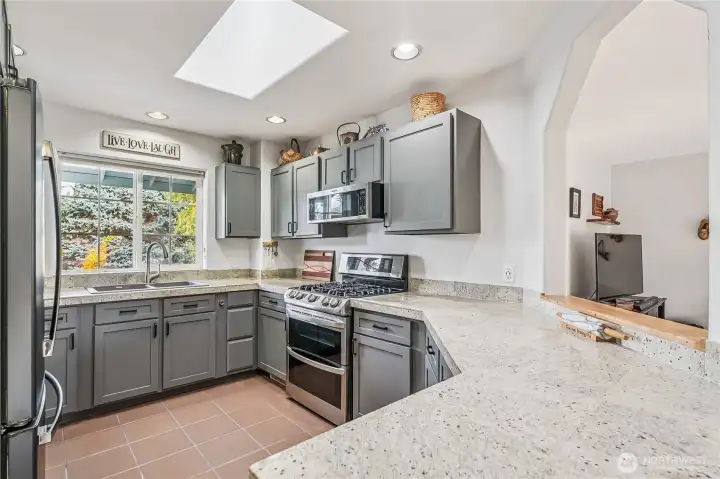 Light & Bright with a suffiecient amount of storage space and built in pull out shelving.