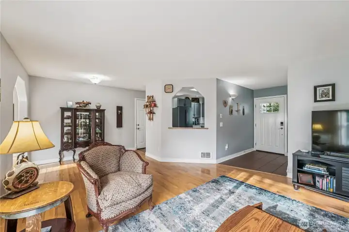 Hardwood flooring and recently painted interior.
