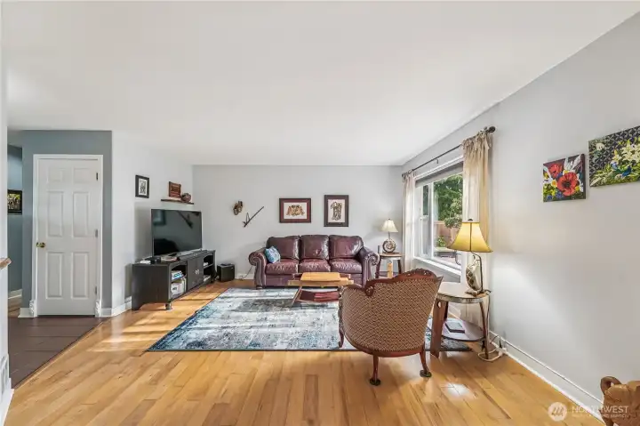 Instantly inviting living room is bright and spacious.
