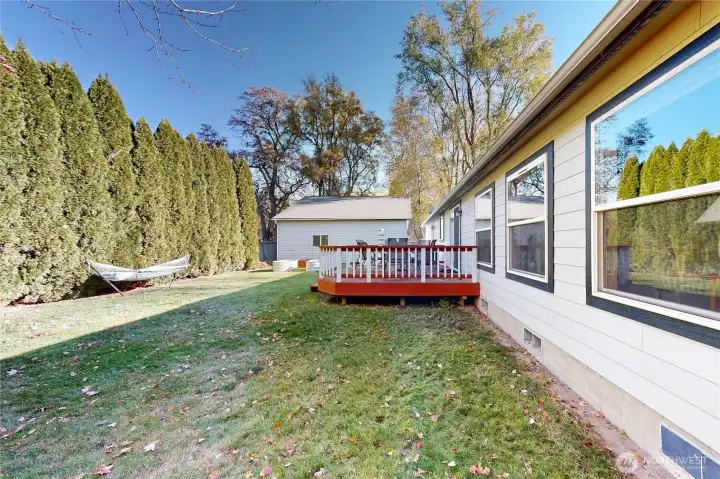 deck off kitchen- patio table stays!