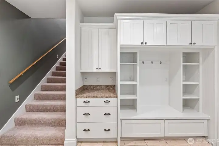 Utility room with custom built-ins... the perfect place to unload, organize, and begin to decompress.