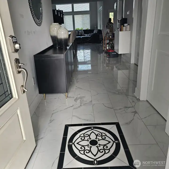 The house welcomes you to a custom medallion.