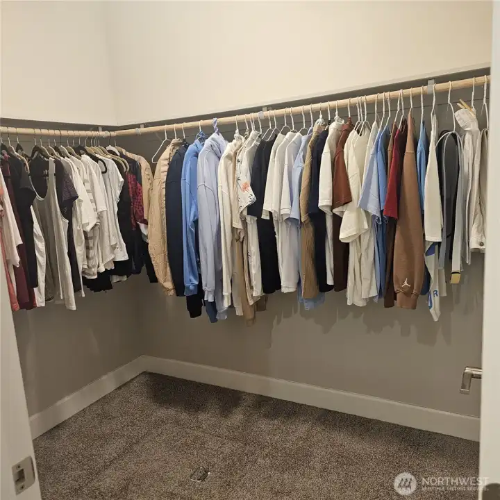 Master closet, picture is of the right side of the closet.