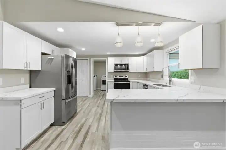 Shaker Style cabinets, soft close throughout, marble countertops.