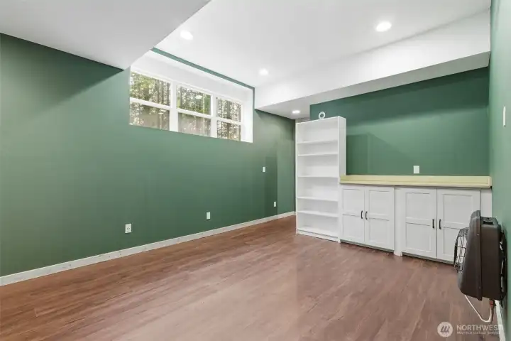 Shop Office built in cabinets and wall heater.