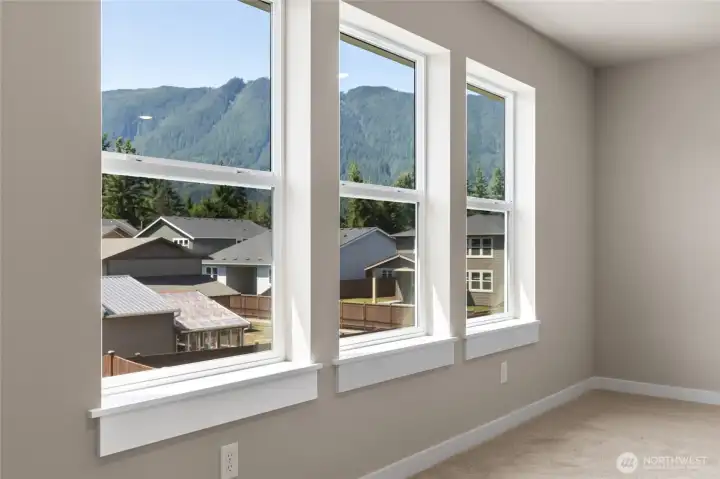 Take in the surrounding views from your flexible bonus space. Incredible views of Mt Si from the neighborhood.  Views and outlooks vary per lot/plan! Picture taken from neighboring home. View vary per lot. See site agent for details.
