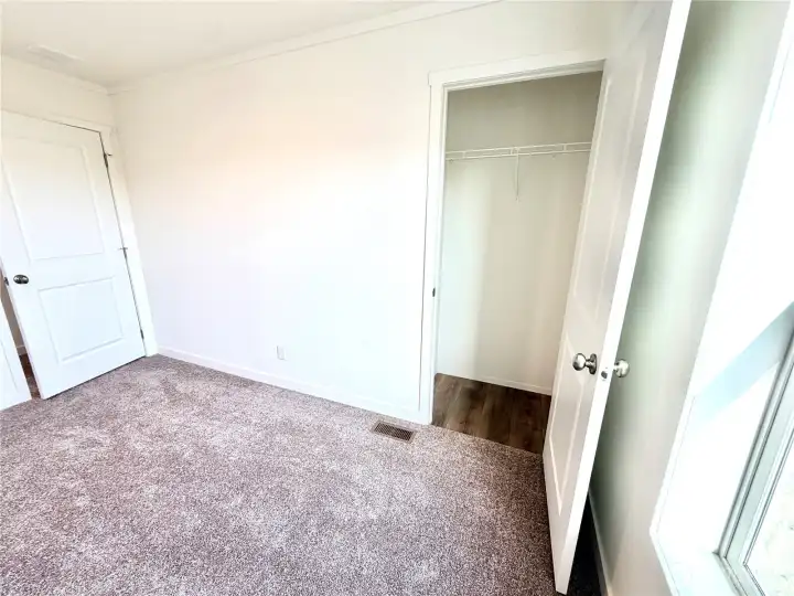 One of two nice size guest bedrooms