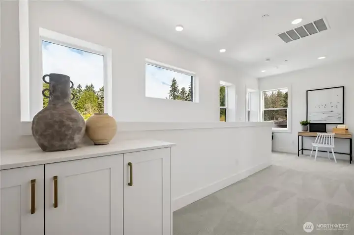 Upper floor hallway with linen cabinet (Facade, Ext Colors, Interior Photos & Floor Plans for illustrative purposes only. Actual Facade, Ext Colors, Interiors & Floor Plans may differ.)
