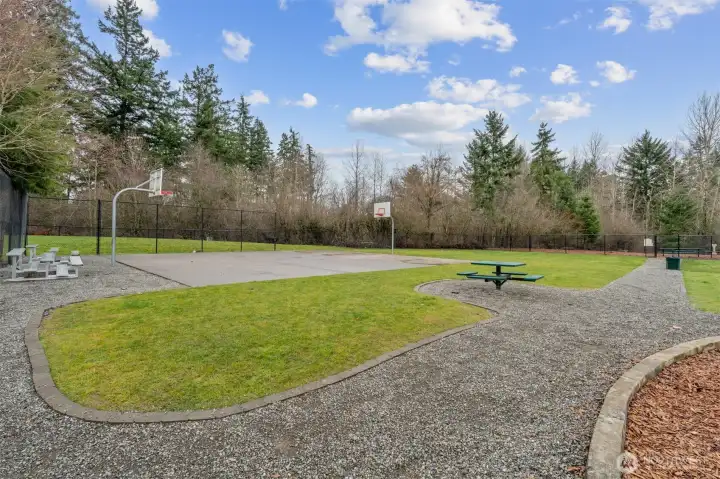 Community amenities include an athletic court, playground and even a dog park for your furry best friends.