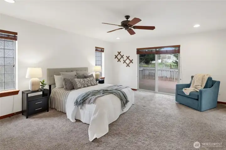 Primary bedroom with direct access to the back yard.