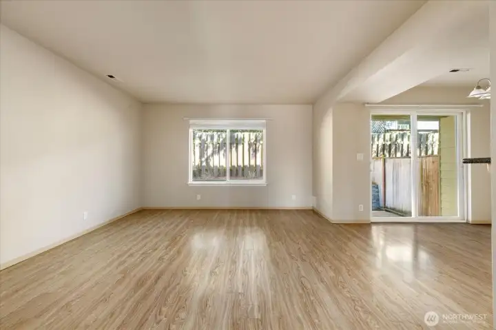 Living room, dinning room with slider to back patio.