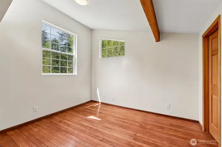 Upstairs bedroom with beam detail