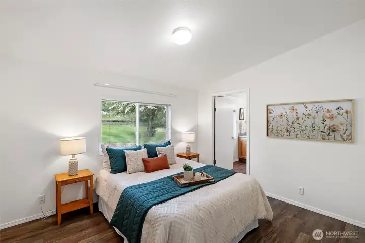 Primary bedroom with double doors