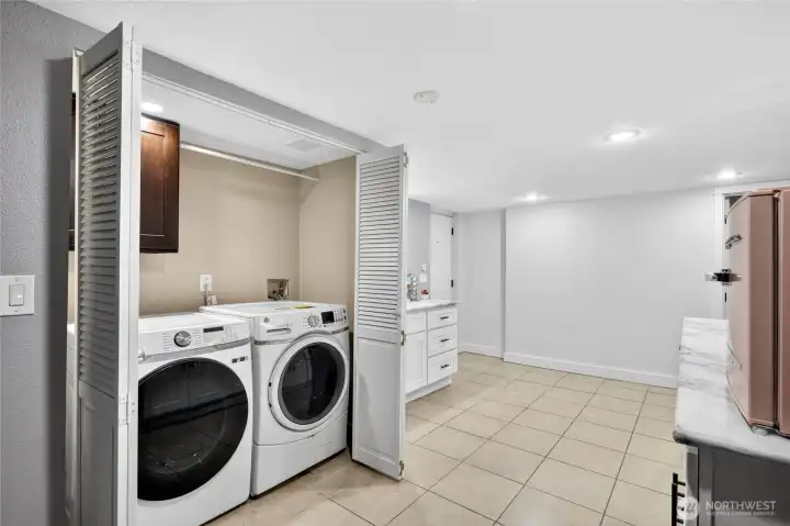 Washer & Dryer located in lower level closet