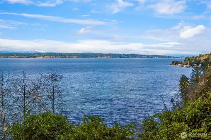 High bluff views with community beachfront access.