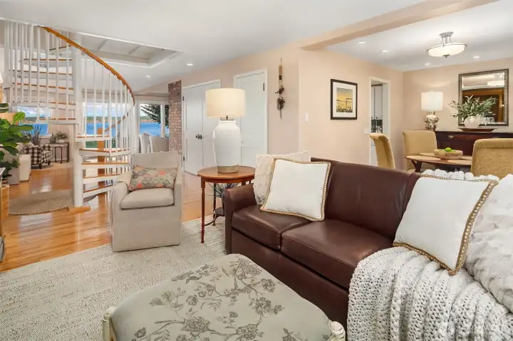Cozy dining area off the kitchen with seating area beyond give an open concept feel.