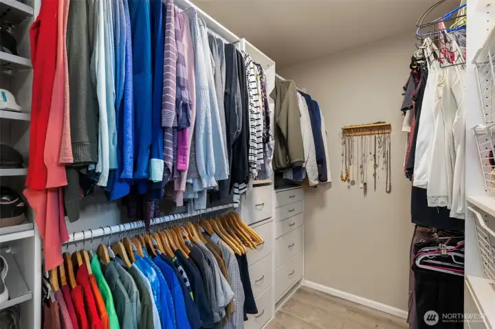 Primary closet with build-ins.