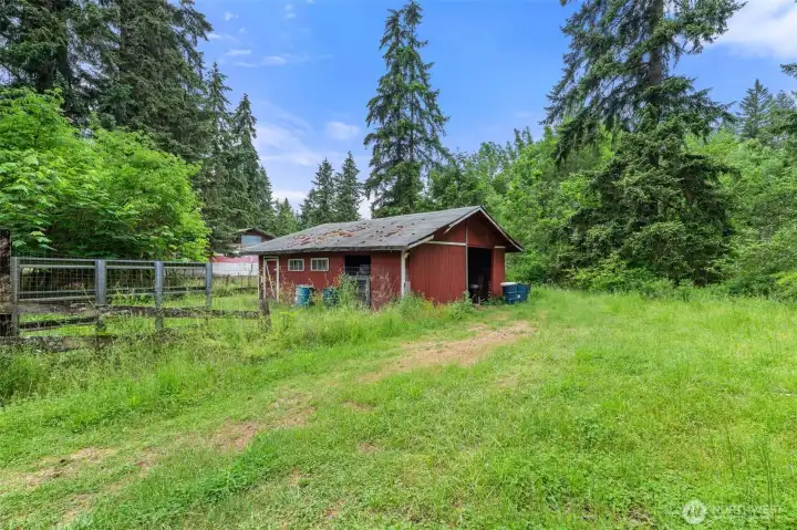 storage with fenced in area, could be used as a chicken coup