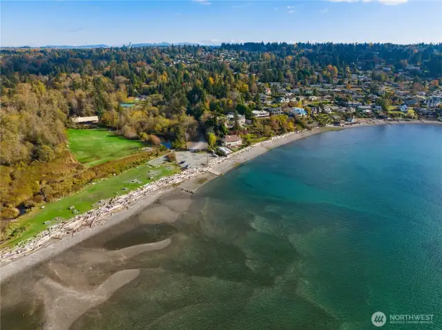 The property has access to the Cove: 700 feet of private community beach with picnic tables, shoreline, community house, trails, ponds...