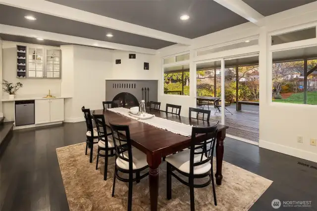 The dining room opens onto the covered patio and backyard.