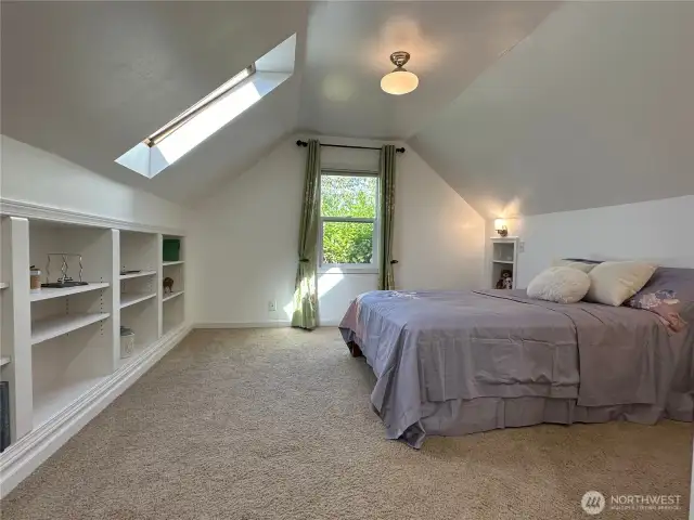 Light filled spaces continue in the upper floor primary suite with sky lights, walk in closet and spa influenced 5-piece bath with huge soaking tub...