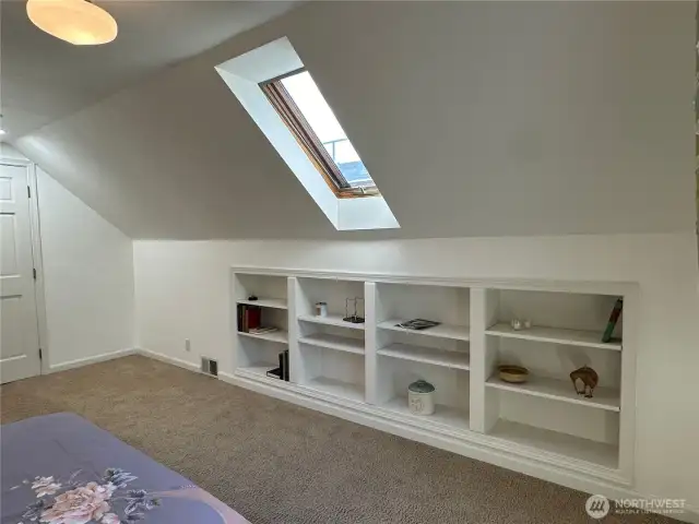 Built in storage, an abundance of natural light, a walk in closet and a spa like bath.