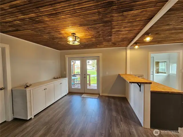 Beautiful French doors leading to covered patio.