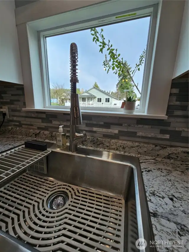 Lots of light from the window, with a large sink.