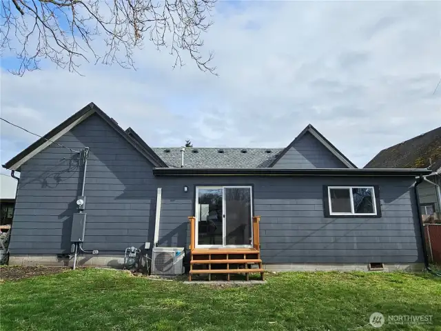 Back yard, with deck off living room.