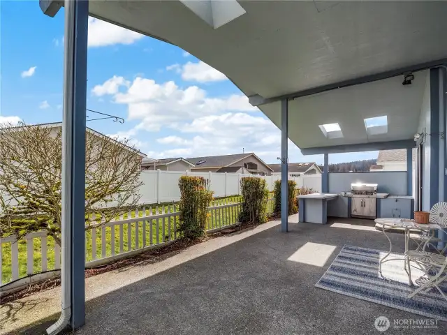 Relax and enjoy warm summer nights entertaining under your covered back patio. Plumbed-in gas grill and spacious outdoor cooking space makes dinner time a breeze!