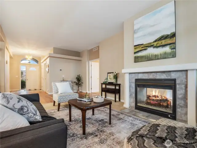 The open great room is the perfect spot to gather for cozy conversations by the fireplace.