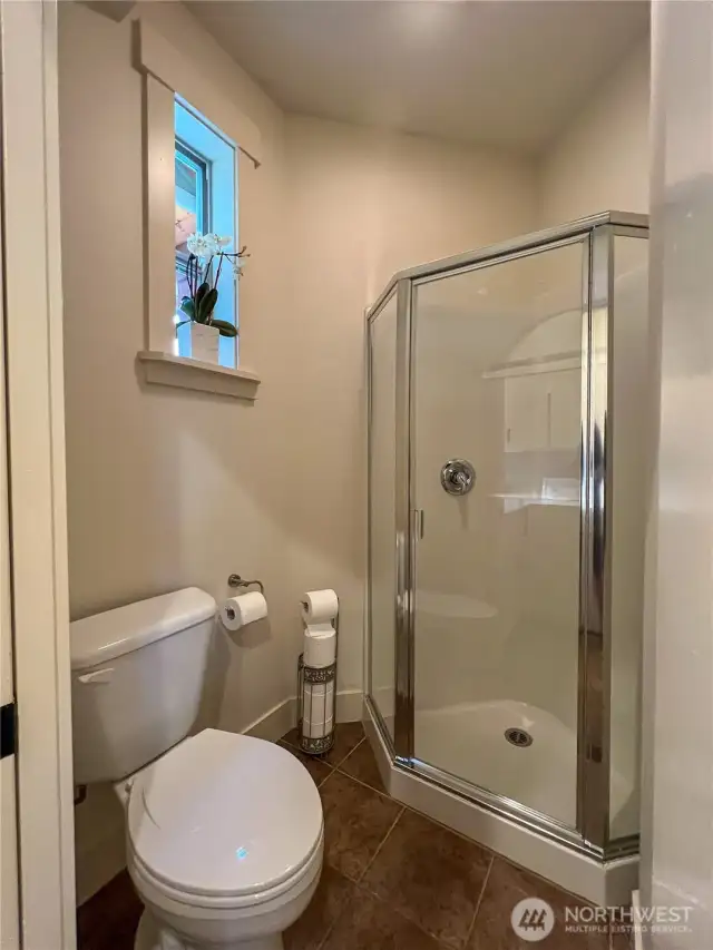 Additional main floor bathroom (3 total on main floor) with walk-in shower.