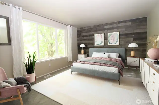 Large window and gorgeous custom wood wall in the primary bedroom.