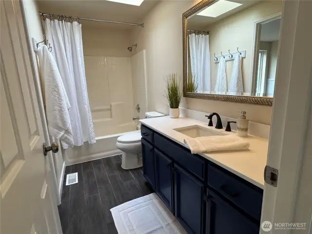 Convenient Jack and Jill bathroom between the two upstairs bedrooms.