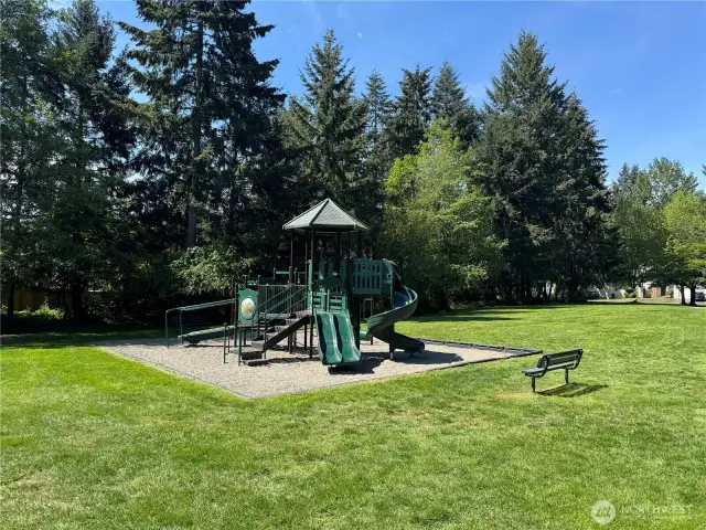 Enjoy a park and playground and walking trail right across the street.