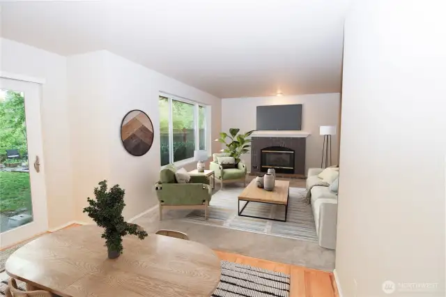 Gas fireplace and large window in the family room.