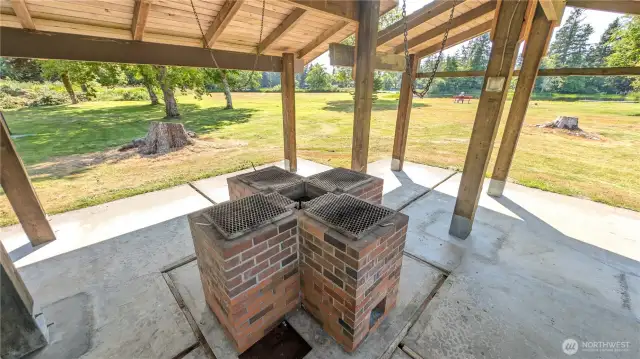 Gather under the Sunset Sands picnic shelter, where built-in grills, shady tables, and lakeside views set the scene for sizzling summer cookouts, cherished reunions, or peaceful meals shared with nature.