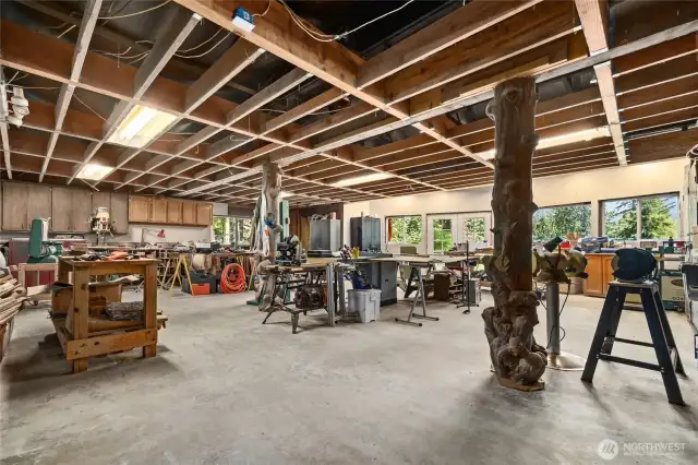Over 1,700 sq ft of unfinished basement currently serves as a workshop and storage area—offering endless potential.