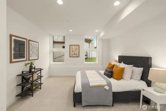 Lower level features a bedroom with an ensuite and closet. New carpet.